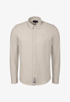 Beżowa koszula z długim rękawem zapinana na guziki, z kołnierzykiem na guziki i małym haftowanym logo na lewej piersi.