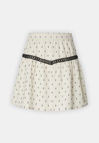 Jupe blanche avec petits motifs floraux noirs, taille élastique et bordure en dentelle noire formant un V à l'avant.