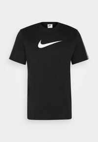 Černé bavlněné tričko s krátkým rukávem, na přední straně s bílým logem Nike. Jednoduchý design s kulatým výstřihem a bez dalších vzorů.