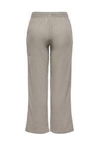 Pantalon gris clair à jambes larges avec ceinture élastique et tissu texturé, montré de dos sur fond blanc uni.
