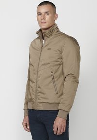 Koroshi Geacă bomber - beige