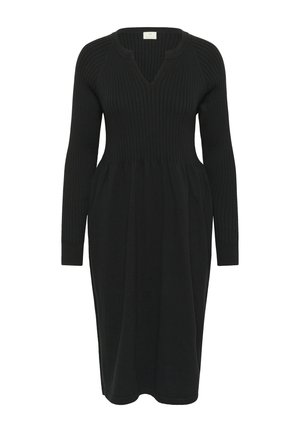 Robe tricotée noire à manches longues, décolleté en V profond, texture côtelée sur le buste, et jupe évasée. Design simple et élégant.