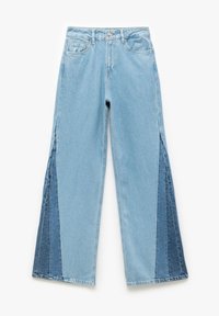 Jeans in denim blu chiaro con gambe ampie, caratterizzati da pannelli laterali color-block in tonalità di blu più scure. Design classico a cinque tasche.