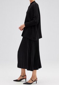 Touché Privé Sweter