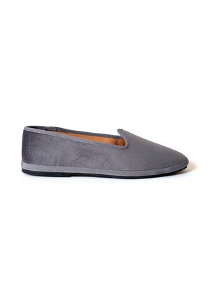 Gray slip-on flat shoe with a soft suede texture and rounded toe, shown from the side on a white background.