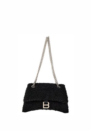 Black textured handbag with silver chain strap and silver letter B clasp on the front flap.