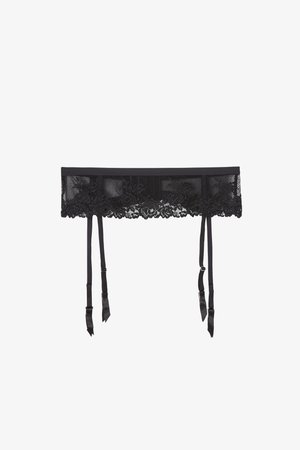 Black lace garter belt with floral patterns and four adjustable satin straps with ribbon ends.