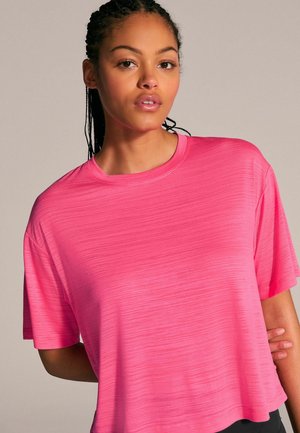 Kortebrasen, rondhals T-shirt in neonroze, gemaakt van lichte, gestructureerde stof met een relaxte pasvorm en subtiele horizontale strepen.