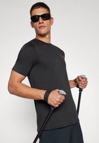 Fjällräven ABISKO WOOL LOGO M - Sportovní tričko - black