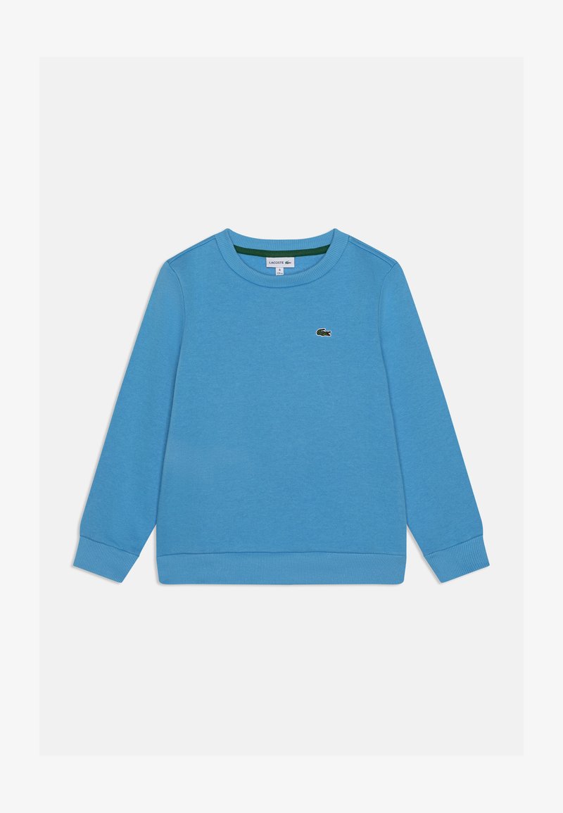 Sweatshirt azul de algodão com mangas longas, punhos e bainha canelados. Apresenta um pequeno logo verde da Lacoste no peito. Textura suave.