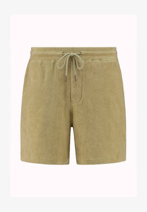 Bermudas de toalla en suave tejido verde oliva. Presenta una cintura con cordón ajustable y puntas metálicas, bolsillos laterales y un corte relajado.