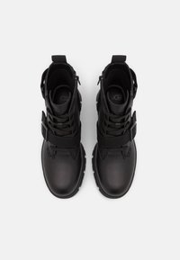 UGG Stivaletti con plateau - black