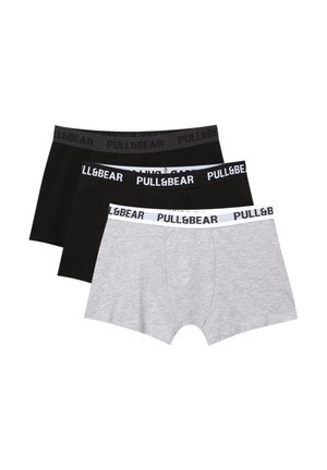 Trois paires de boxers pour hommes en gris et noir. Ils présentent des ceintures élastiques avec le logo "PULL&BEAR" en blanc sur des fonds gris et noirs.