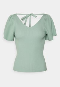 Miętowa prążkowana bluzka z krótkimi bufkowymi rękawami i dekoltem w kształcie litery V. Posiada wiązanie z tyłu dla regulowanego dopasowania.