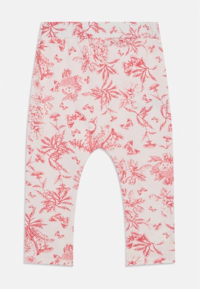 Red floral printed leggings with a soft, stretchy fabric; features a white background and design of various flowers and butterflies.