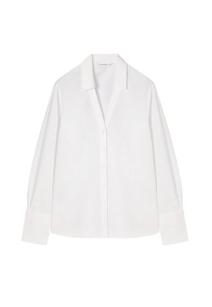 Camicia bianca a maniche lunghe con colletto a punte, chiusura con bottoni e una vestibilità rilassata. Realizzata in un tessuto morbido con una consistenza fresca.