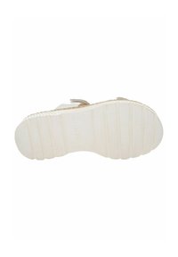 White rubber sole with a textured surface and vertical grooves. Logotype visible in the center. Rounded toe design, minimal detailing.