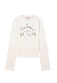 Witte lange mouwen t-shirt met "GARICA" en "1972" in zwart gedrukt boven een ster. Zachte stof, cropped ontwerp, ronde halslijn, minimalistische stijl.
