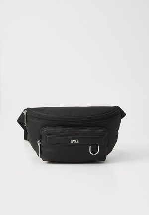 Black nylon fanny pack with a curved design, front zip pocket, and silver hardware accents. Features a logo on the front panel.