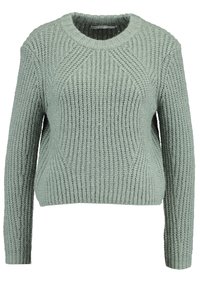 Hellgrüner Strickpullover mit rundem Halsausschnitt, strukturiertem Rippenmuster und langen Ärmeln. Lässige Passform mit leicht verkürzter Länge.