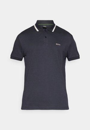 Námořnická polokošile z bavlny, s dvouknoflíkovou légou, límcem s kontrastními pruhy a malým vyšívaným logem na hrudi.