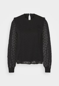 Blouse noire à manches longues avec manches transparentes à pois, bordure en dentelle sur la poitrine et les poignets, et fermeture goutte d'eau boutonnée à l'arrière du col.