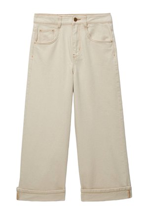 Pantalon ample beige avec poches avant et poche monnaie, fermeture par bouton et fermeture éclair, et revers roulés à l'ourlet.