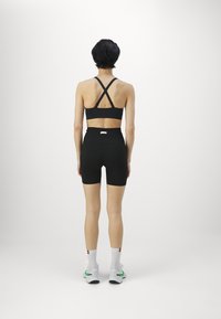 Björn Borg STUDIO SEAMLESS SHORTS - Tamprės - black beauty