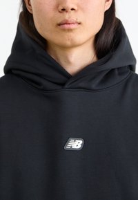 New Balance ALL DAY UNIFORM HOODIE UNISEX - Mikina - black