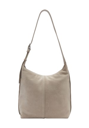 Jasno beżowa, zamszowa torebka na ramię z jedną regulowaną rączką, subtelnym tłoczonym logo oraz gładkim, matowym wykończeniem. Krzywoliniowy kształt.