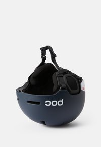 Casque de ski avec une finition mat bleu marine, doté d'un revêtement intérieur rembourré, de sangles ajustables, de trous de ventilation et d'un logo blanc sur le côté.