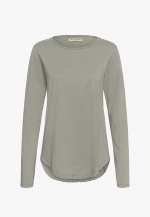 Ilgomis rankovėmis, šviesiai pilka suapvalinta apykaklė marškinėliai su šiek tiek išlenkta apačia, iš Love Copenhagen prekės ženklo.