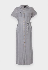 Ριγέ, πουκαμισοφόρεμα σε ναυτικό μπλε και λευκό, με κοντά μανίκια, ζώνη στη μέση και δύο τσέπες στο στήθος. Υφάσματος με μοτίβο και μαλακή υφή.