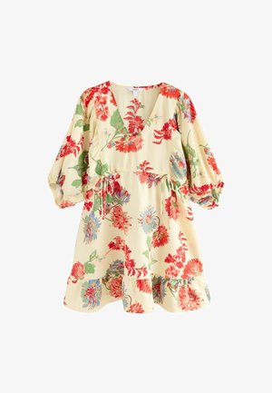 Vestido floral con escote en V, cortas mangas abullonadas, decorado con flores rojas, azules y verdes sobre un fondo crema; cintura ajustada con detalle de lazo.