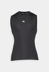 Black sleeveless athletic top made from stretchy fabric. Features a round neckline and a small white logo on the chest. Smooth texture.