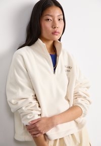 New Balance GRAPHIC POLAR HALF ZIP - Sweat polaire - beige