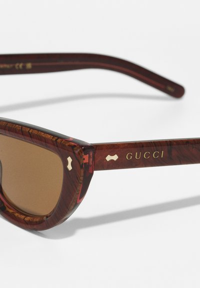 Gucci Óculos de sol - pink/brown