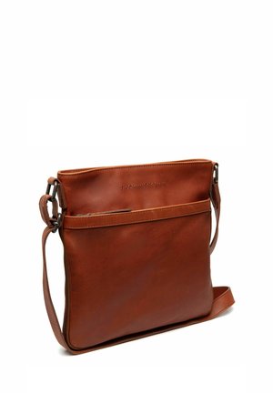 Brown leather messenger bag with a smooth texture, adjustable shoulder strap, front zip pocket, and embossed logo on the upper side.