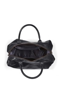Sac en cuir noir avec double poignée, fermeture éclair, et un intérieur spacieux avec une doublure en tissu contrastant.