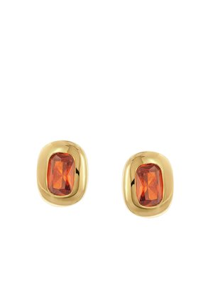 Pair of gold stud earrings each featuring a rectangular faceted orange gemstone set in a smooth, rounded gold frame.