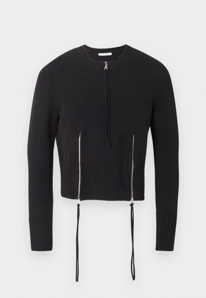Sort, strikket cropped sweater med lange ærmer, ribbede manchetter og kant, udstyret med en øverste lynlås og to lodrette lynlåse med lange trækamp på fronten.