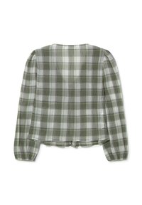 Chemise à manches longues à carreaux verts avec une coupe ample, comportant des manches bouffantes et un col rond. Le tissu est léger et légèrement transparent.