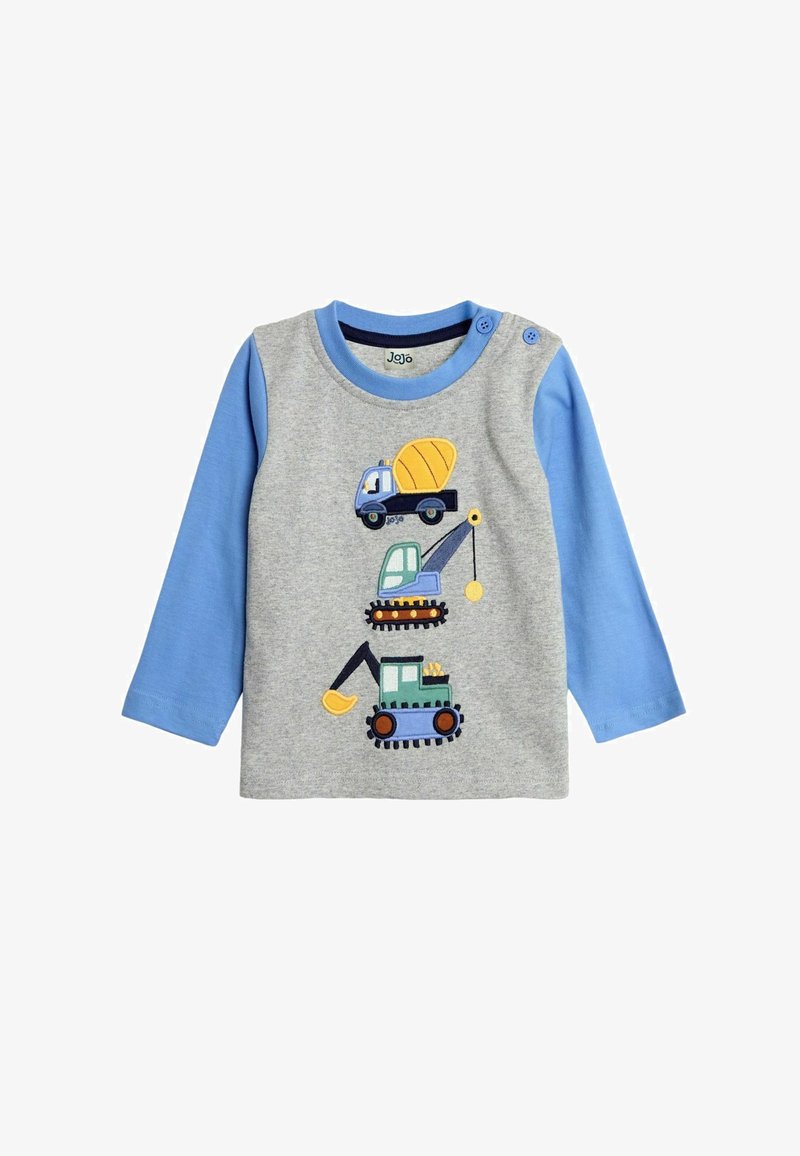 Harmaa pitkähihainen paita, jossa on siniset yksityiskohdat. Edessä näyttäviä kuorma-autoja ja rakennuskoneita esittelevät aplikaatiot. Pehmeää puuvillakangasta.