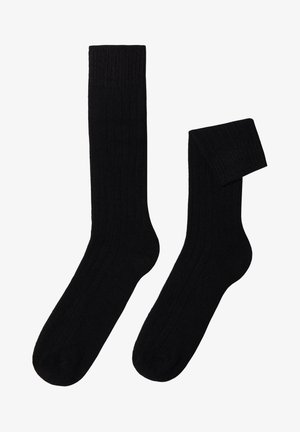 Schwarze gerippte Socken mit glatter Textur, einem langen Schaft und einem umgeschlagenen Bund. Weiches Material, geeignet für den täglichen Gebrauch.
