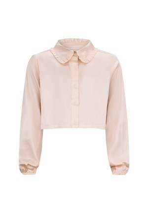 Gekürzte Bluse mit langen Ärmeln aus weichem beigen Stoff, ausgestattet mit einem Rüschenausschnitt und einer Knopfleiste. Besitzt elastische Bündchen für eine enganliegende Passform.