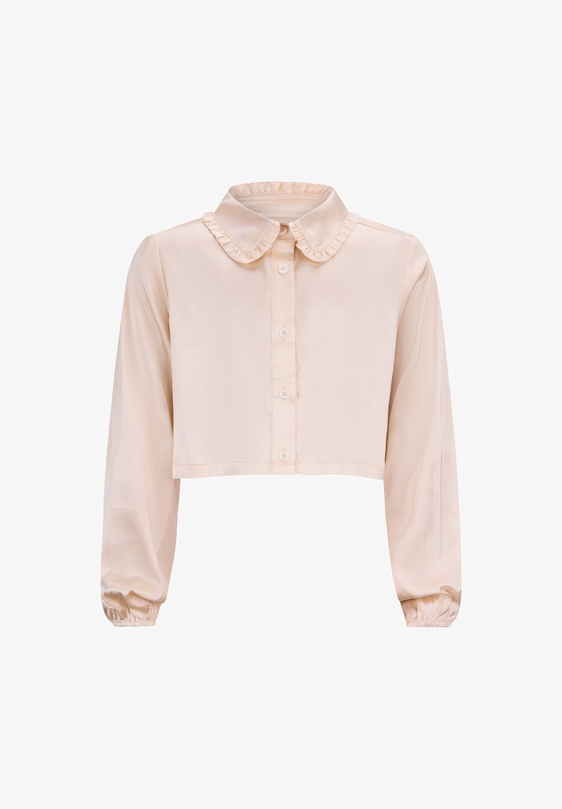 Cropped, long-sleeve blouse in soft beige fabric with a ruffled collar and button-front closure. Features elasticized cuffs for a fitted look.