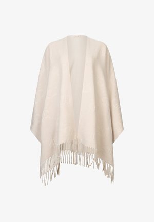 Châle beige en tissu doux et texturé. Ouverture sur le devant, sans fermetures, avec des franges décoratives à l'ourlet. Motif subtilement embossé sur l'ensemble.