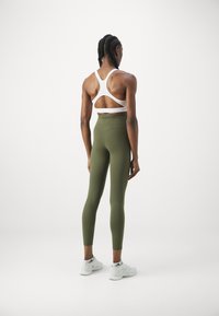 Björn Borg STUDIO CROSS - Leggings - olive night