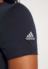 adidas Sportswear W LIN T - Majica kratkih rukava s printom - legend ink/white