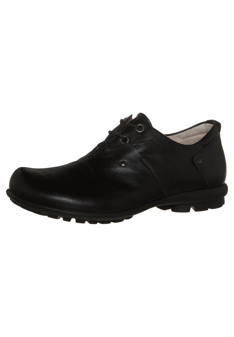 Black leather shoe with a rounded toe, features thin laces, textured upper, and a low rubber sole with small treads for grip.